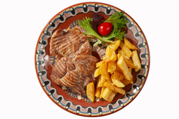 Chicken steak with potatoes and salad