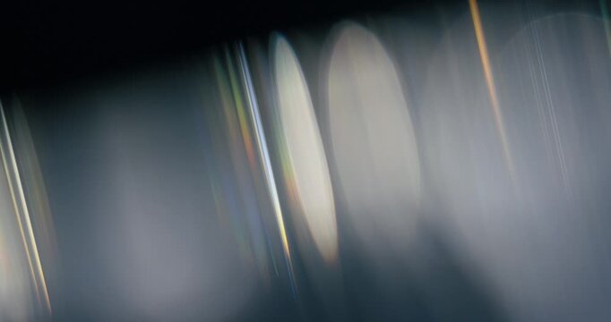Captivating and mesmerizing abstract reflections of light that are beautifully crafted through prisms, making them ideal for use in motion graphics and stunning visual effects that attract the eye