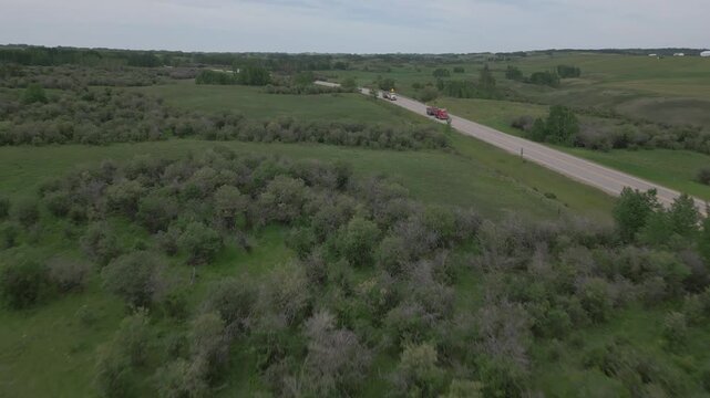 Prairie highway from the air in summer