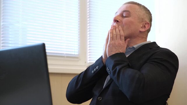 Manager reacts to computer call. Professional individual displays varied emotions during digital communication