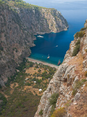 Fototapeta premium Butterfly valley ( Turkish; Kelebekler vadisi ) Fethiye town, Muğla coast, Türkiye
