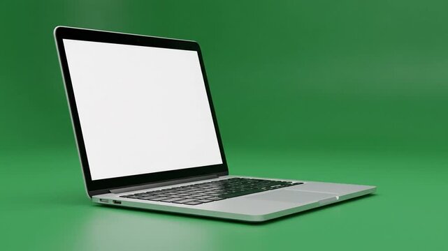 Open silver laptop with blank white screen on a vibrant green isolated background, Modern notebook computer with empty display on green backdrop