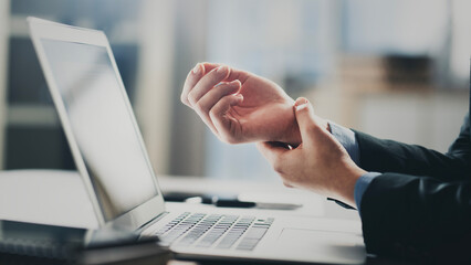Fototapeta premium Wrist pain due to computer use