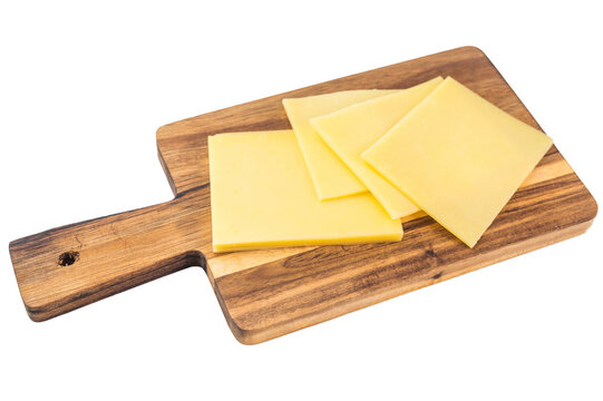 Neatly stacked yellow cheese slices on white background, Edam Gouda Havarti type semi hard dairy food ingredient