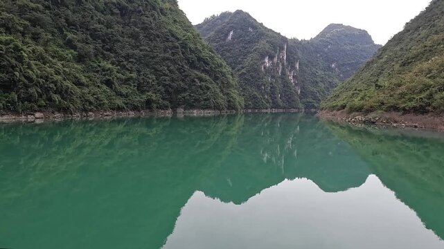 Scenic view of Wujiang River cruise ride at Chongqing, China. It allows tourists to enjoy the beauty of the mountains and rivers and explore the natural landscape