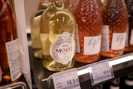 Moscow, Russia - January 25, 2026: Masi Moxxi white wine bottle displayed on shelf with price tags in a retail store, various wines in background