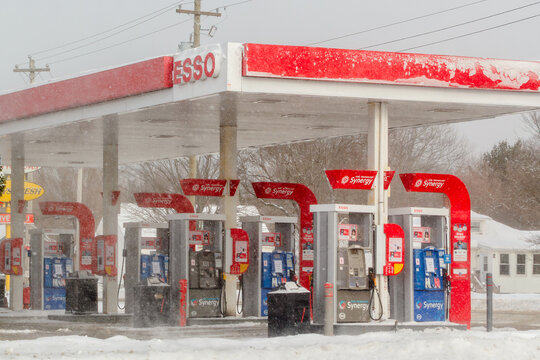 Brookfield, Canada - January 27, 2025: Esso gas station during winter. The Esso brand is owned by ExxonMobil.
