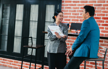 Professional Colleagues Brainstorming Ideas in a Modern Collaborative Workspace