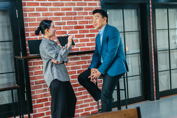 Professional Colleagues Brainstorming Ideas in a Modern Collaborative Workspace