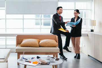 Professional Colleagues Brainstorming Ideas in a Modern Collaborative Workspace