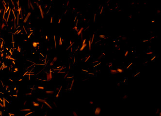 A black background with a lot of fire and smoke