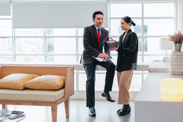 Professional Colleagues Brainstorming Ideas in a Modern Collaborative Workspace