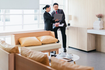 Professional Colleagues Brainstorming Ideas in a Modern Collaborative Workspace