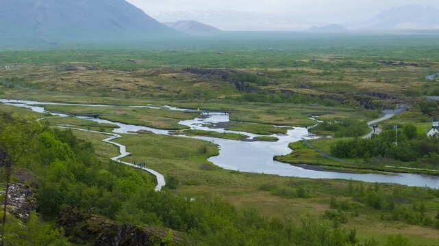 Iceland. Thingvellir National park, a rift valley where the North American and Eurasian tectonic plates meet. Time-lapse of nature and people, panning video