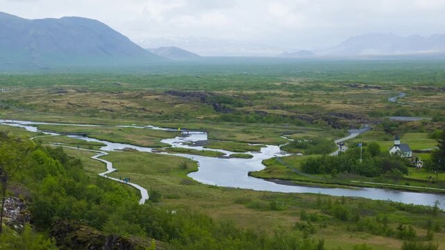 Iceland. Thingvellir National park, a rift valley where the North American and Eurasian tectonic plates meet. Time-lapse of nature and people, zoom in