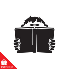 Boy reading a book vector icon