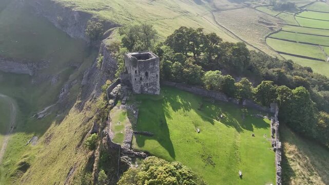 Aerial view over Peveril Castle, Castleton, Derbyshire, 4K Video.