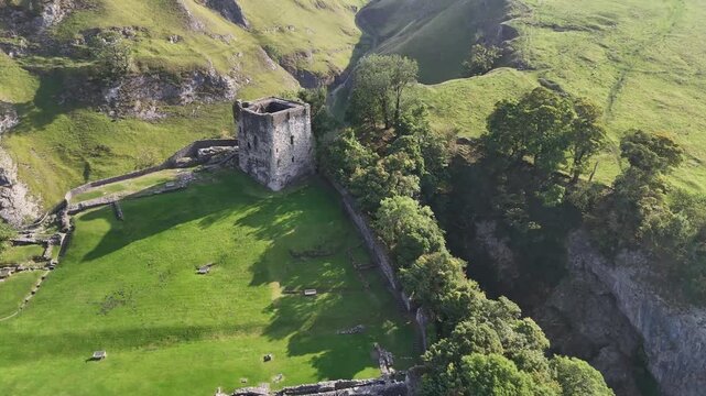 Aerial view over Peveril Castle, Castleton, Derbyshire, 4K Video.