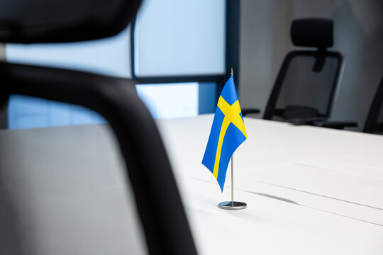 Swedish national flag on a white  table in the office