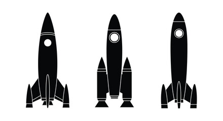 Fototapeta premium Three black rocket ship silhouettes against a white background silhouette