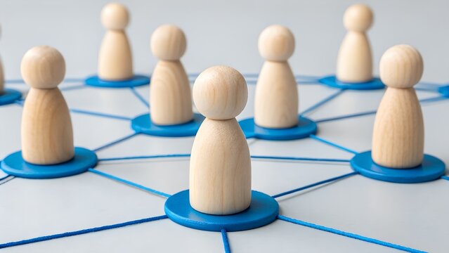 Teamwork and Network Concept &ndash; Wooden Peg Figures Connected by Blue Lines, Collaboration, Social Structure, Interpersonal Communication