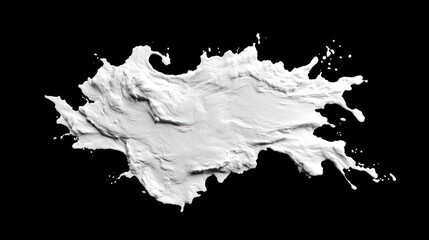 A splattered white liquid on a black background viewed from directly above in a photographic close-up.