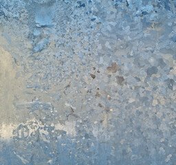 Obraz premium Frost patterns on glass. Background. Space for design and text. Selective focus.