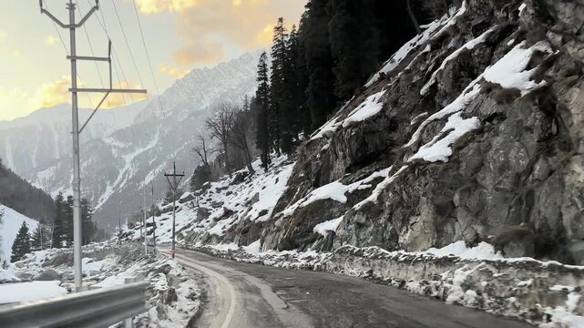 Scenic video of the mountain road and pathway leading to Sonmarg, passing through lush valleys, flowing rivers, and majestic Himalayan landscapes in Jammu and Kashmir.