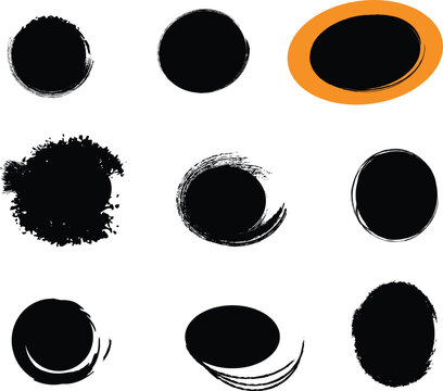 Collection of black circular smudges and one orange highlighted shape