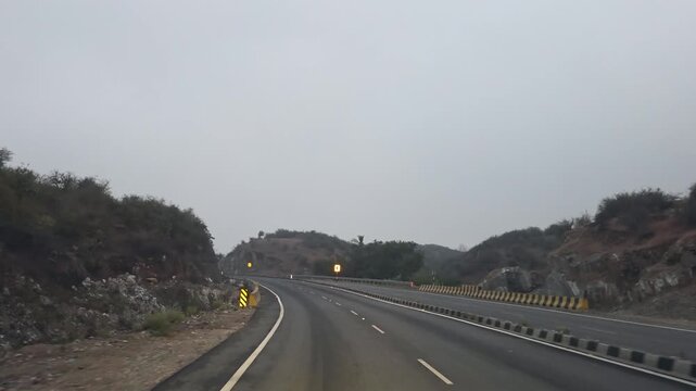 Winding road through hills in Udaipur