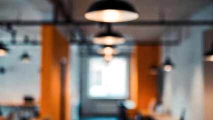 Fototapeta premium Modern industrial office interior with warm lighting and blurred background