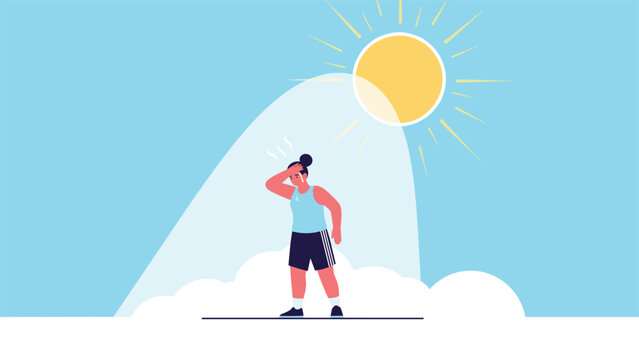 Tired woman wipes sweat from her forehead while standing under a bright and extremely hot sun during the summer.