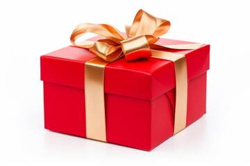 Obraz premium Red gift box with a golden ribbon and bow, symbolizing celebration and surprise