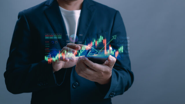 Business investor analyzing stock market data on smartphone with digital candlestick chart, financial growth trend, trading strategy, fintech technology and investment analytics concept.