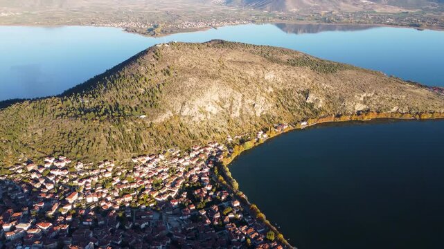Kastoria 4K. Curve Aerial Shot. Orestiada Lake. Sunset. Amazing Greece