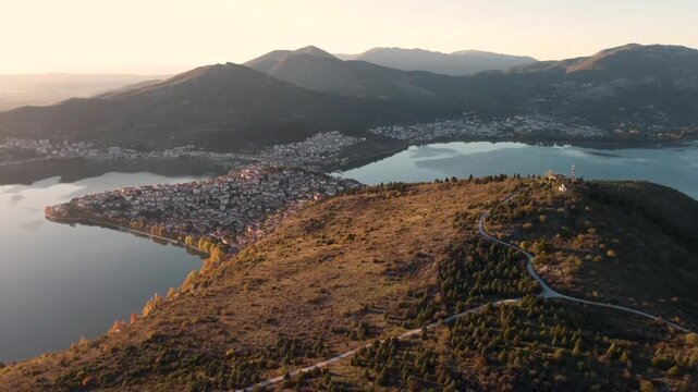 Kastoria 4K. Sunset Aerial Shot. Orestiada Lake. Isthmus City. Amazing Greece