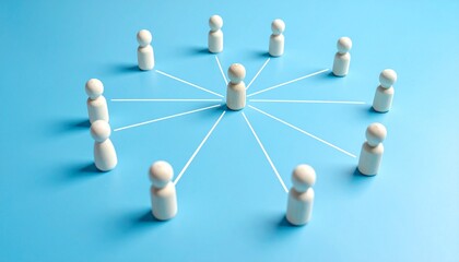 Obraz premium Centralized Network of Wooden Peg Dolls on a Blue Background Representing Strategic Leadership