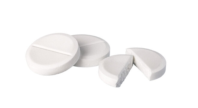 White pills and broken tablet on transparent background