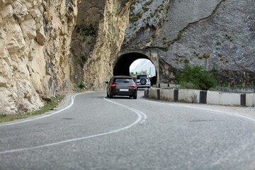 Obraz premium Car driving stunning mountain road background.