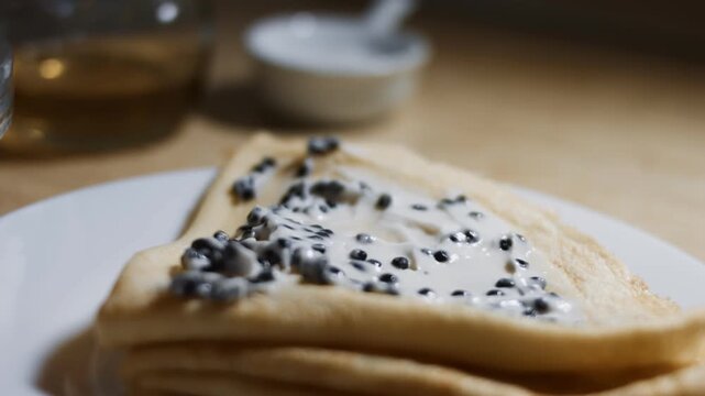 Lump Fish black Roe Blinis, Isolated closeup
