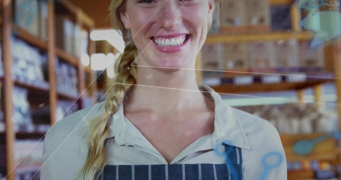 Baker holding bread basket as camera rising revealing smile, overlays crossing frame showing goods