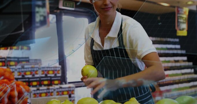 Cam pulling back showing produce clerk sorting yellow fruit for retail display with overlaying lens
