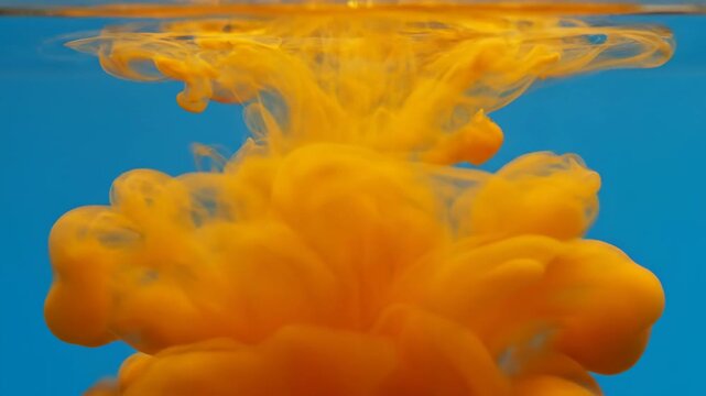 Single fish food pellet floating in clear blue water. Aquaculture concept.