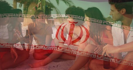 Obraz premium Sitting six adults talking on beach sand by palms, holding bottles, wearing swimwear, flag overlay