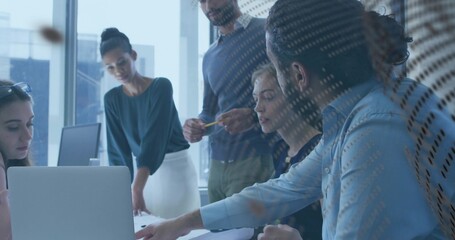 Obraz premium Collaborating five office team in shirts reviewing laptop and papers in glass room, dotted film