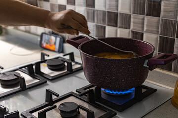 These photos illustrate how meals are cooked on gas stovetops in kitchens, and how rising food...