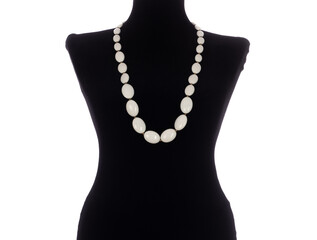 Necklace with white stones on a mannequin isolated on white background