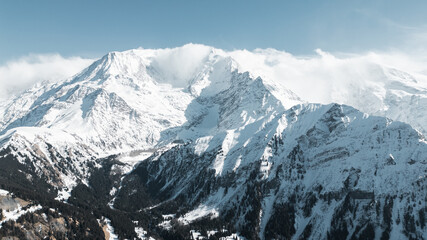 Obraz premium Snow-covered Alpine mountains near the Swiss city