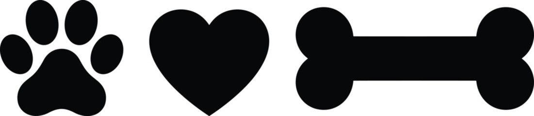 Black silhouette icons of a dog paw print heart and bone set on white background for pet lover animal themes © MdLliaj