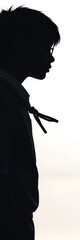 Silhouette of a figure in a school uniform against a bright background,  figure,  shadow